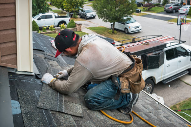 Professional Emergency Roof Repair technician working in Woodstock, VT